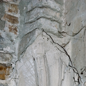 Decorazione in stucco relativa ad una foglia d'acanto che riveste l'imposta della volta